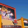 Bâche publicitaire grand format avec œillets pour Cinéma 4D Belpark, impression haute qualité extérieur résistant sur façade avec cadre alu .
