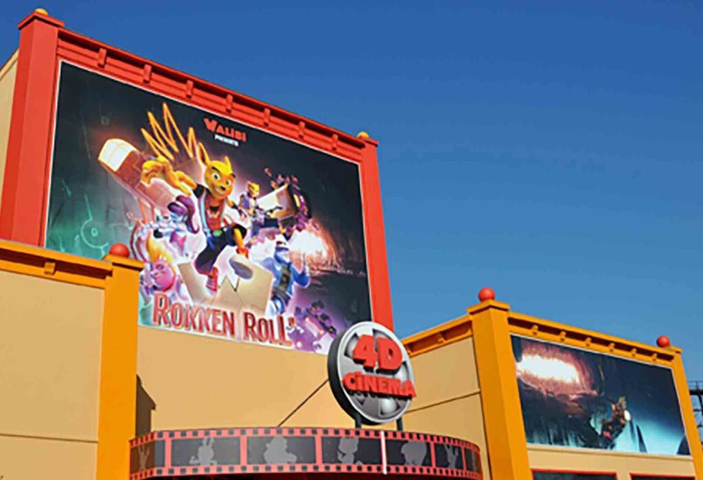 Bâche publicitaire grand format avec œillets pour Cinéma 4D Belpark, impression haute qualité extérieur résistant sur façade avec cadre alu .