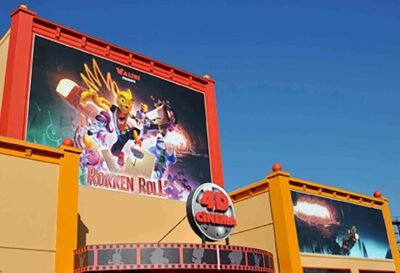 Bâche publicitaire grand format sur cadre alu pour Cinéma 4D Belpark, impression XXL de haute qualité extérieur résistant sur façade.