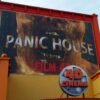 Bâche publicitaire grand format avec œillets pour Cinéma 4D Halloween Belpark, impression haute qualité extérieur résistant sur façade avec cadre alu .