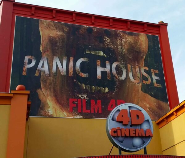 Bâche publicitaire grand format avec œillets pour Cinéma 4D Halloween Belpark, impression haute qualité extérieur résistant sur façade avec cadre alu .